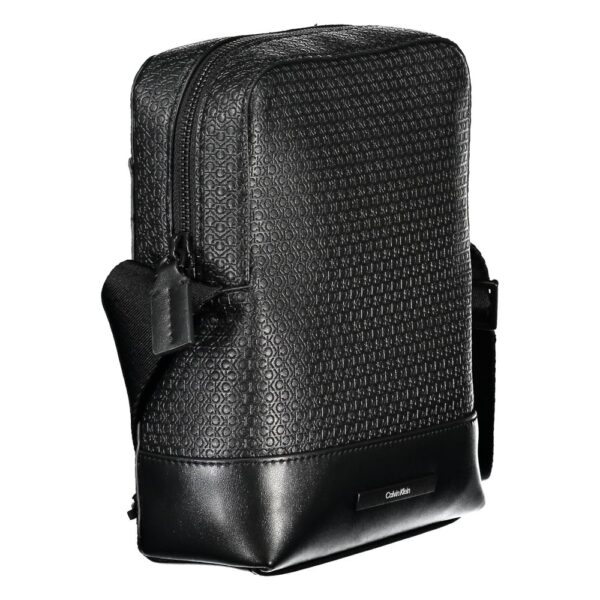 7468128.jpeg Calvin Klein elegantiška juoda rankinė su kontrastingais akcentais