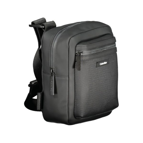 7516083.jpeg Calvin Klein juoda vyriška rankinė